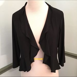 Medium polyester/spandex shrug