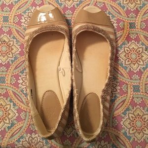 Tan and cream flats
