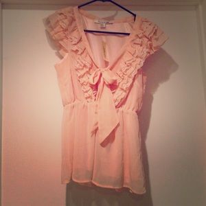 Beautiful blush blouse, perfect for warm weather.