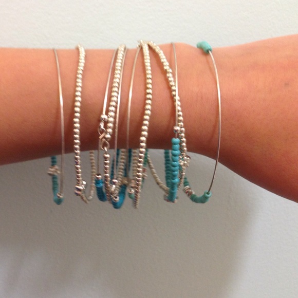 A st of silver and blue bracelets!