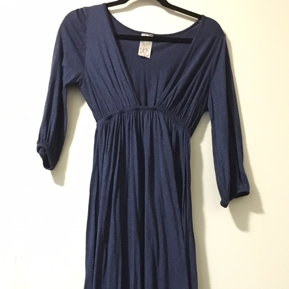 Sparkly blue midi dress with low v-neck line.