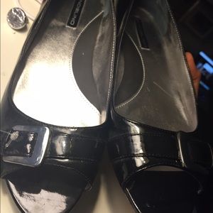 new never worn black shiny flats with belt on toe