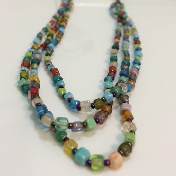 A very colorful, beaded, layered necklace.
