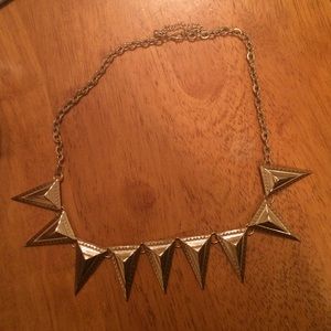 Gold spike statement necklace