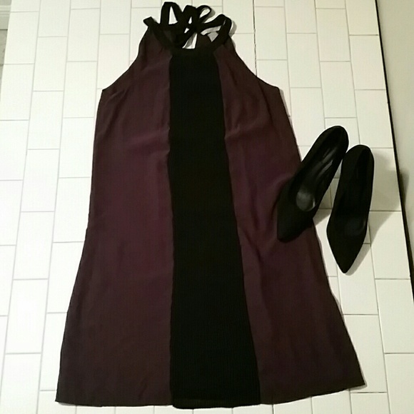 Purple tie-neck tunic with black pleated detail