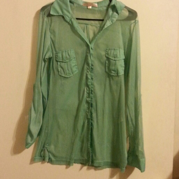 See thru pastel green blouse