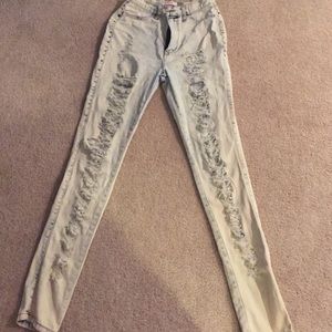 Acid washed ripped jeans