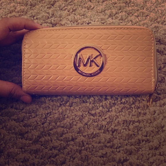 Tan MK wallet/clutch