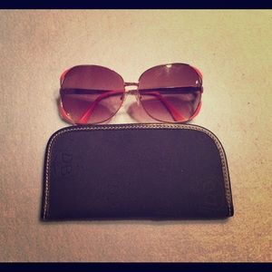 Dooney and Bourke soft eyeglass case.