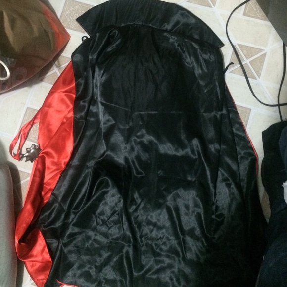 Vampire cape and medal