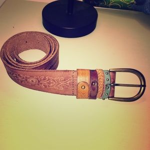 Leather belt with flower engraving