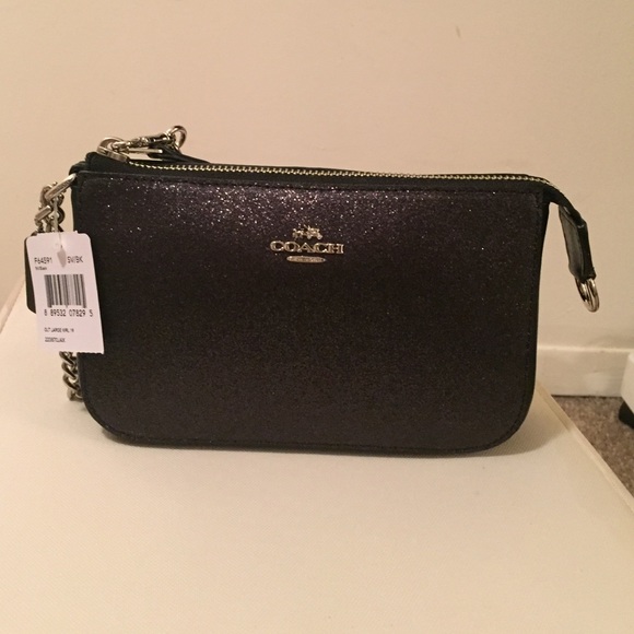 Black sparkle COACH wristlet
