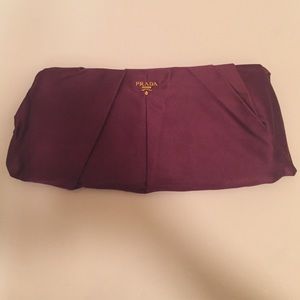 Prada plum clutch