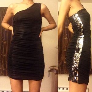 Short black dress. One shoulder.