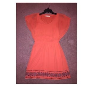 Orange dress with tribal stitching