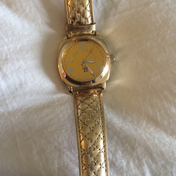 Dooney and Bourke gold large size watch