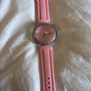 Dooney and Bourke pink rubber band watch.