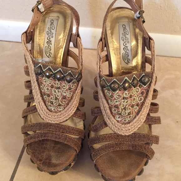 Beautiful high heels with colored detailed design.