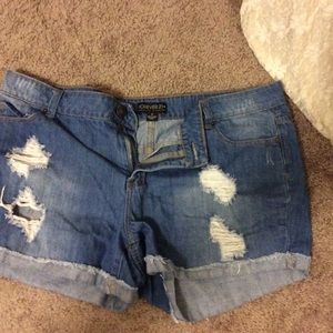 Destroyed denim shorts