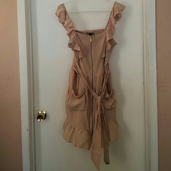 Ruffle zip up dress with pockets and bow