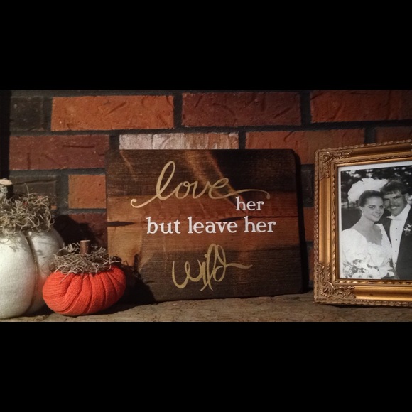 Love her but leave her wild wood sign