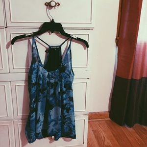 Blue floral flowy express razor back tank top.