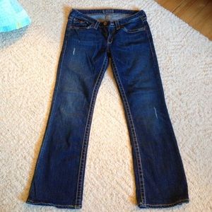 Big star blue jeans, semi distressed.