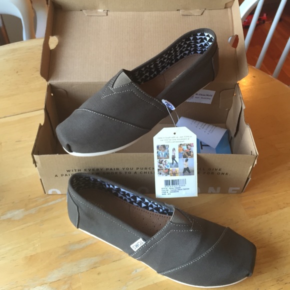 New with tags green toms