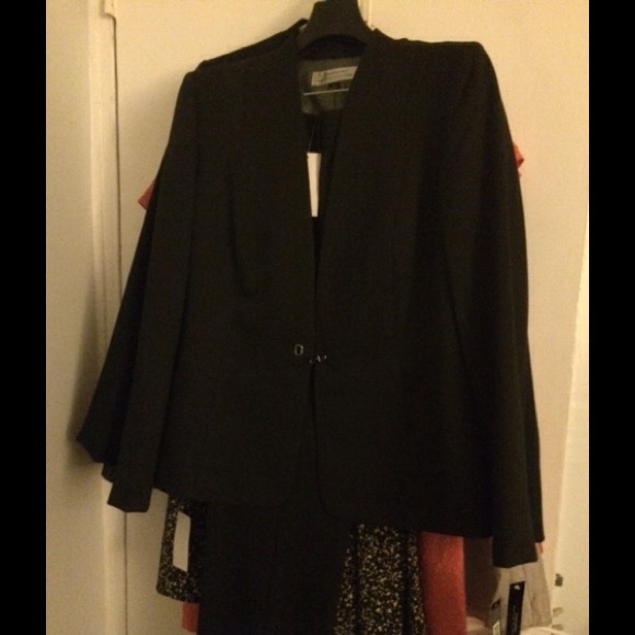 Navy blue suit. Never worn.