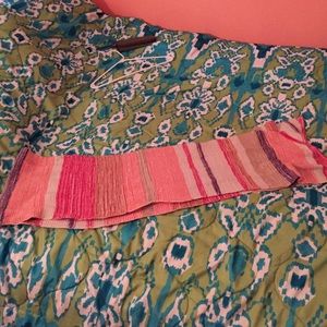 Cute pink and white with grey long scarf.