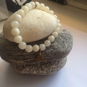Cute white faux marble bracelet with Buddha charm