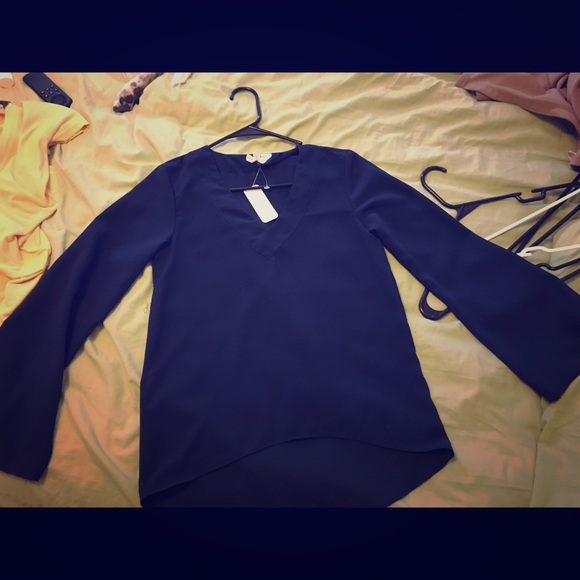 100% polyester dark blue shirt. Thin material