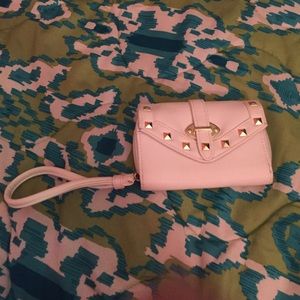 Cute white clutch with gold spikes