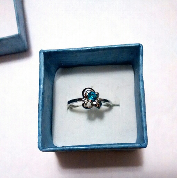 Silver plated ring size 6 light blue cz stone