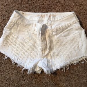 AE white sequin jean shorts