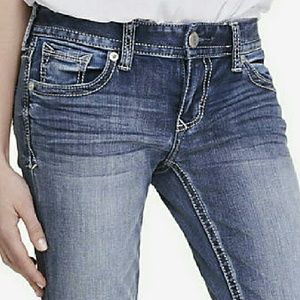 Express medium wash low rise barely boot jeans