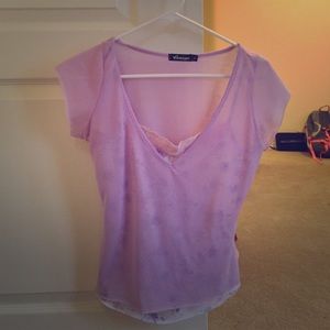 Pink shirt with white floral cami underneath