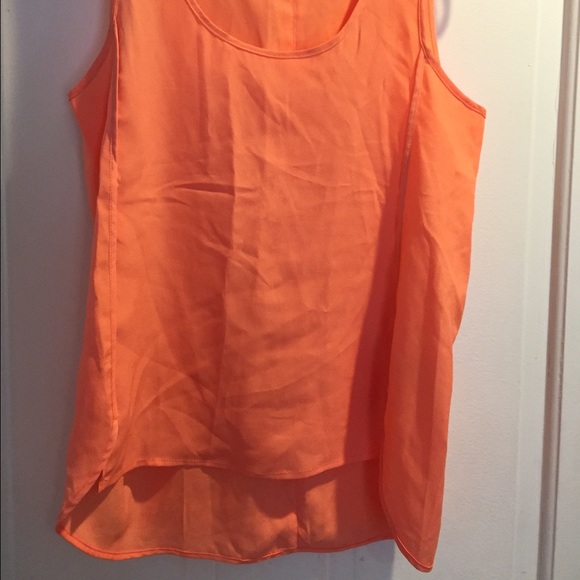 Orange sleeveless blouse