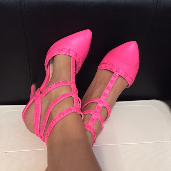 Neon pink studded shoes