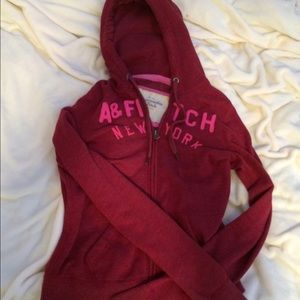 Maroon / red zippered jacket