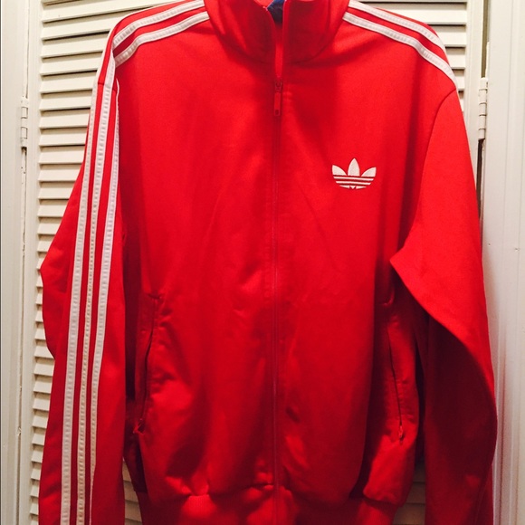 A red Addidas jacket/training ,,,