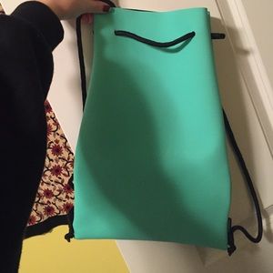 Triangl bathing suit backpack