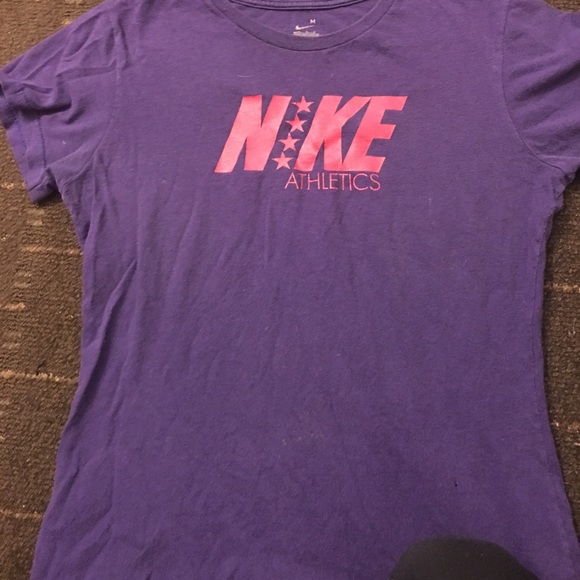 purple and pink nike shirt
