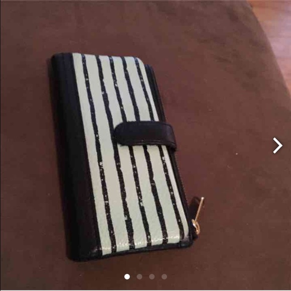 Black & mint fossil wallet and multicolored wallet