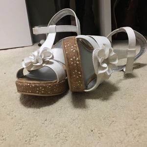 White wedges with flower