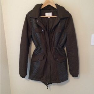 Brown cotton parka with pleather detail.