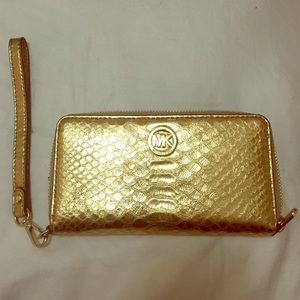 Michael Kors gold clutch/wallet/wristlet