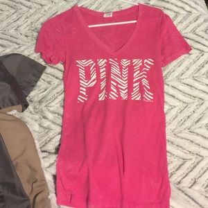 Pink shirt.