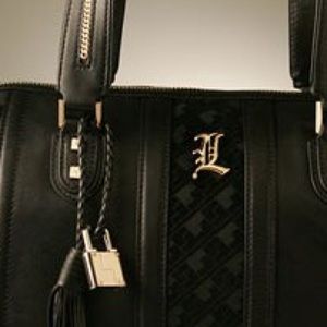ISO gold removable lock for this style L.A.M.B.
