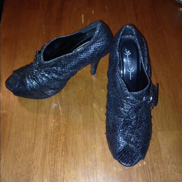 Snake skin peep toe shoe booties
